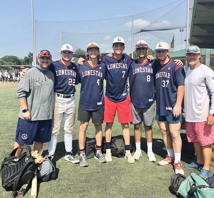 A group of Windmill players in navy jerseys